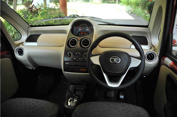 The new steering wheel and black centre console are noticeable changes inside the cabin; and of course the AMT gear lever. 